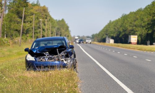 Dented,Car,Damaged,After,Traffic,Accident,Parked,On,Highway,Roadside.